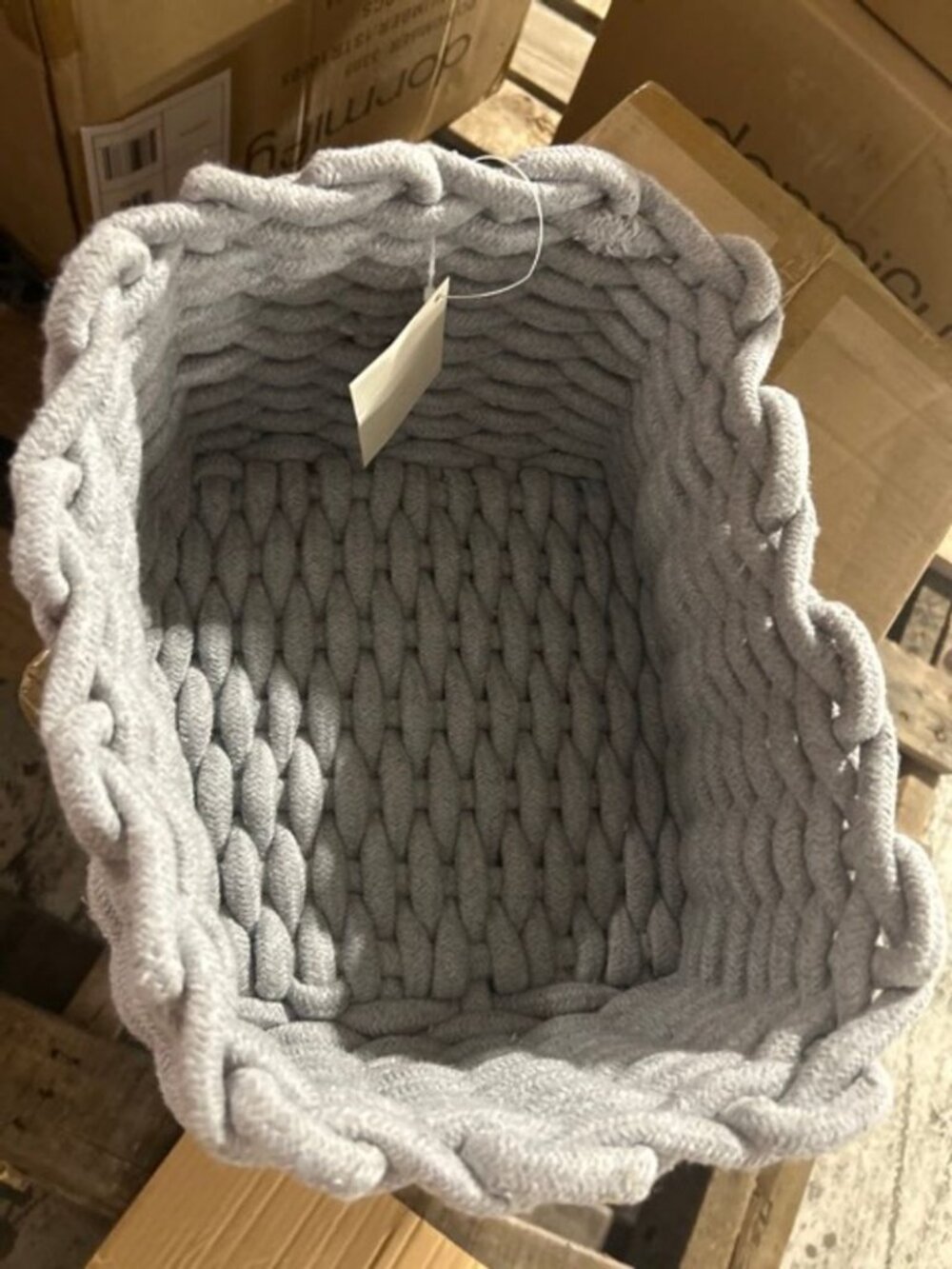 18 Grey knitted storage bins.